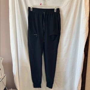 Women’s XS Healing Hands black jogger scrub bottoms. One zip leg pocket